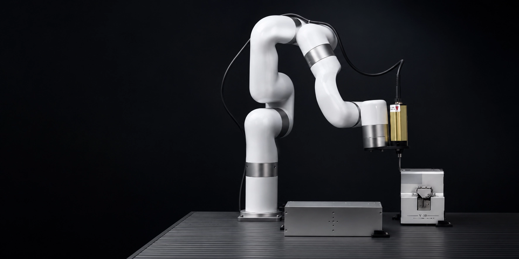 UFACTORY cobot with an electric screwdriver mounted at the wrist, positioned beside a screw feeder on a workbench