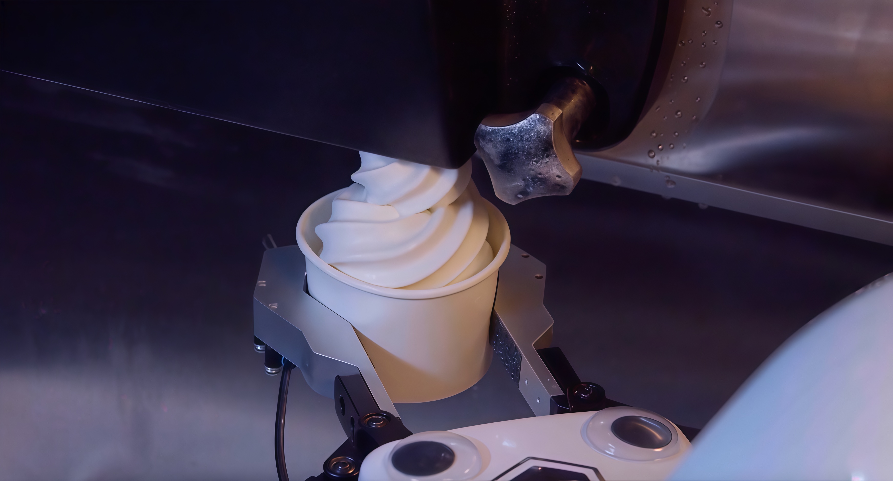 xArm holds a cup beneath a soft serve dispenser during automated ice cream dispensing